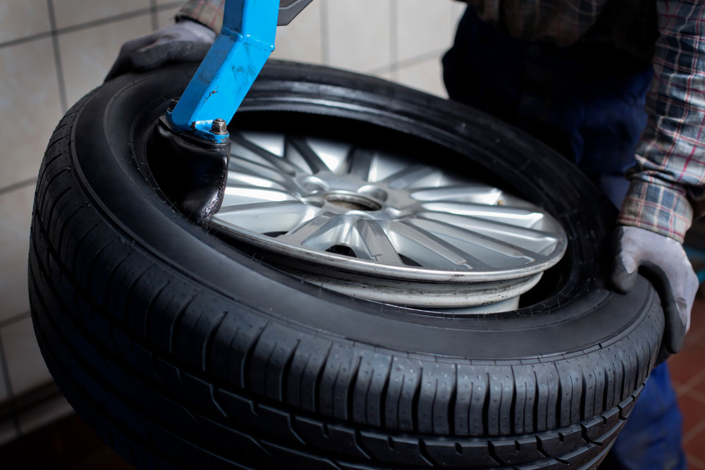 Engineer Repairing a tyre