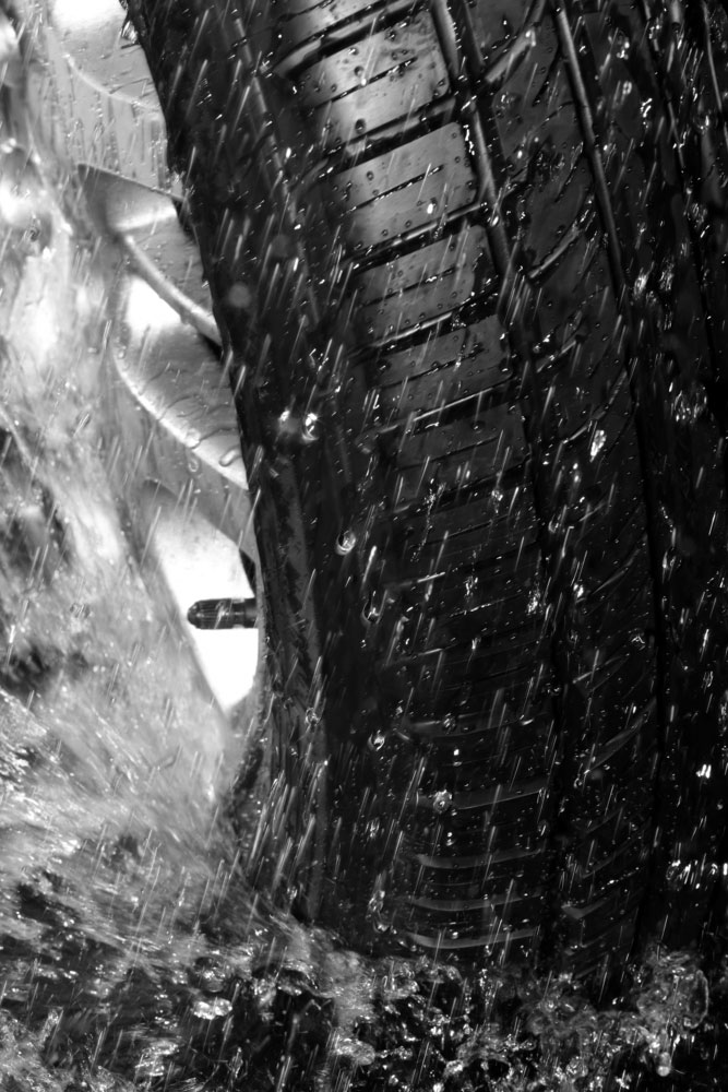 good tyre tread grips on a wet road